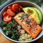 Herb-Roasted Salmon Bowl with Quinoa Kale Salad & Avocado