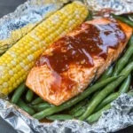 Barbecue Salmon Foil Packets with Green Beans and Corn on the Cob